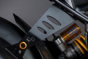 Triumph Rx Exhaust Bracket <p>Nero</p>